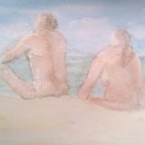 back view of nudist couple on the beach