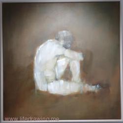 Back view of seated nude man