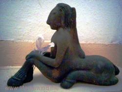 ceramic centaur sitting